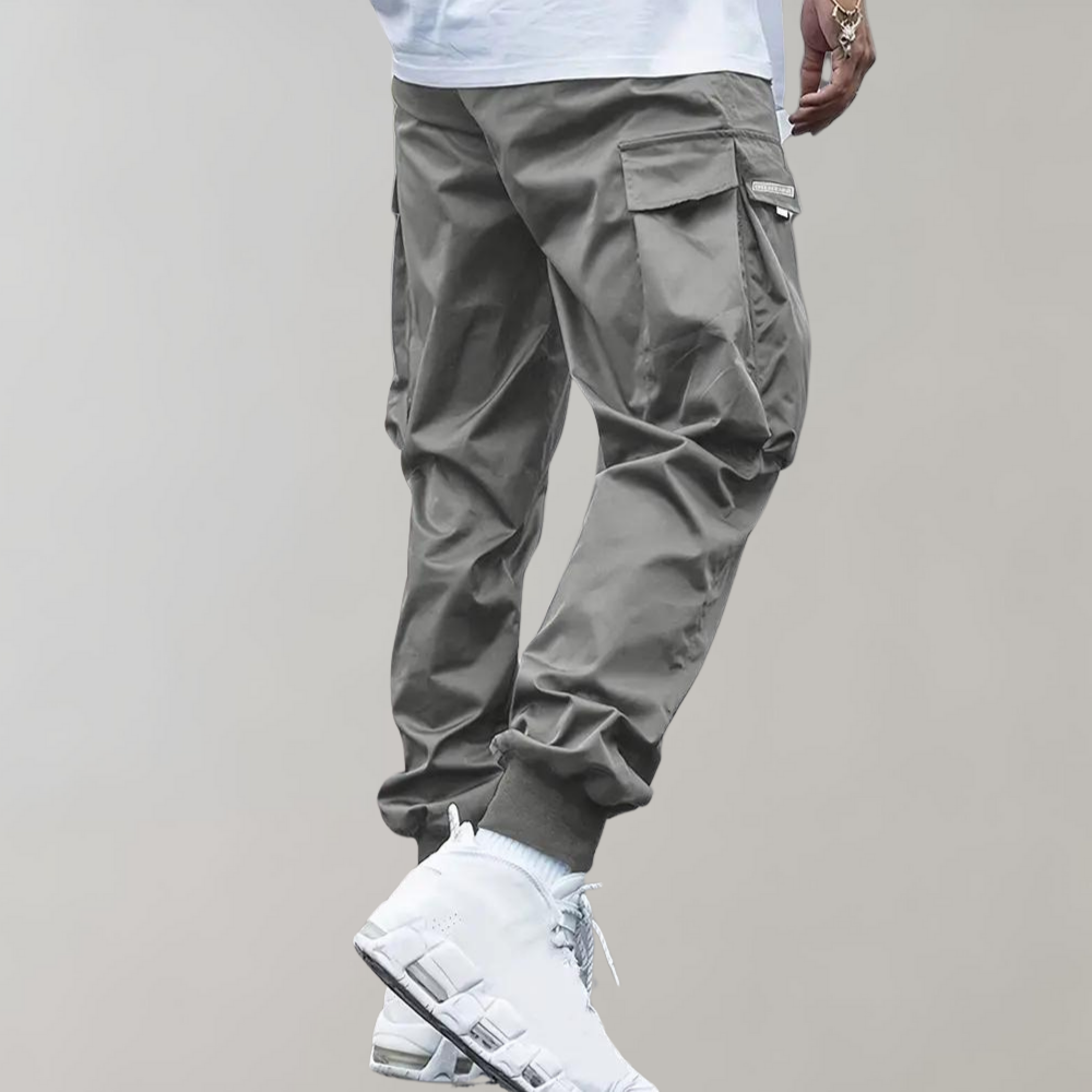 Alpenfeld™ | Herren Cargo Jogginghose – Lila Streetwear-Hose mit Reißverschlusstaschen & Bündchen